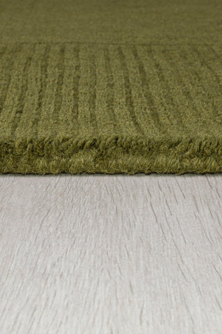 Alfombra con bordes de lana texturizada