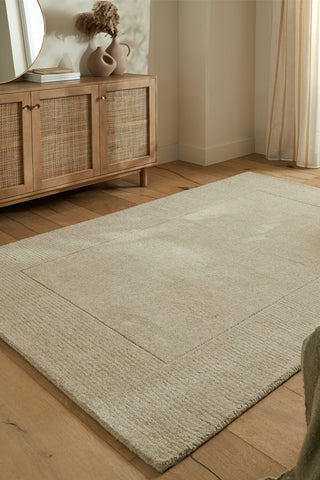 Alfombra con bordes de lana texturizada